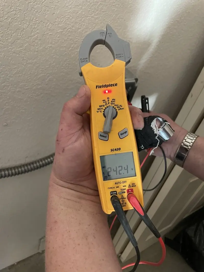 Voltage testing with clamp meter during Whole House Surge Protector in Hoopeston